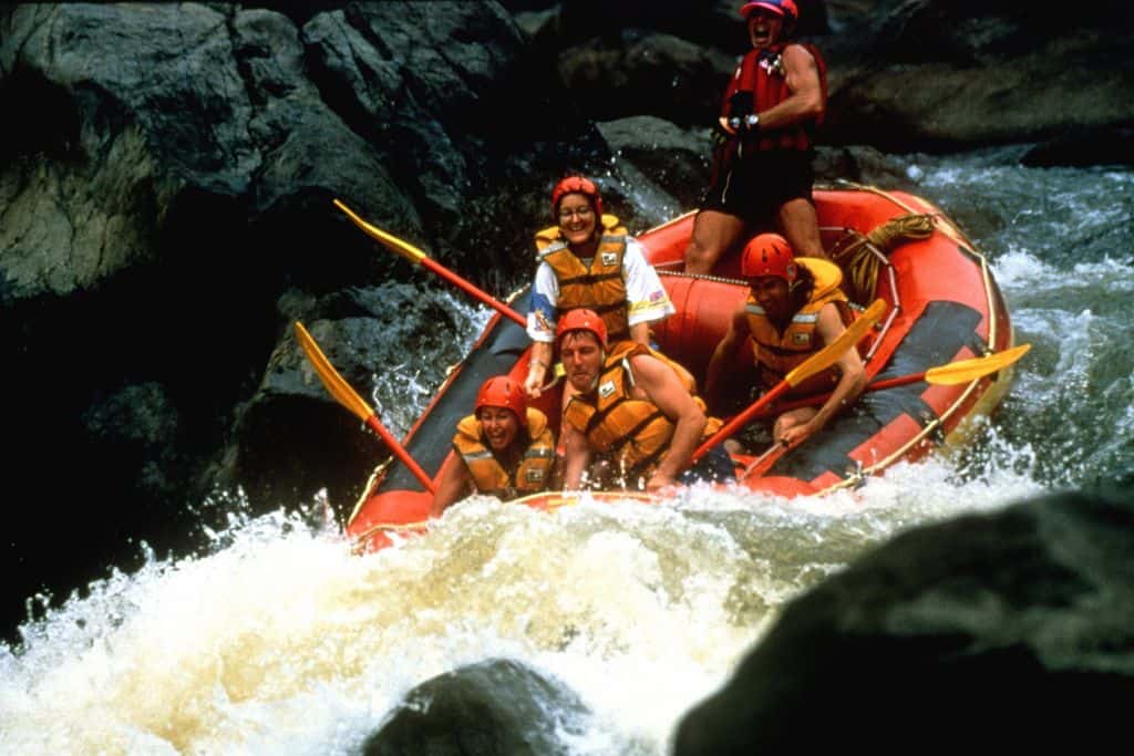 Rafters going down a waterfall