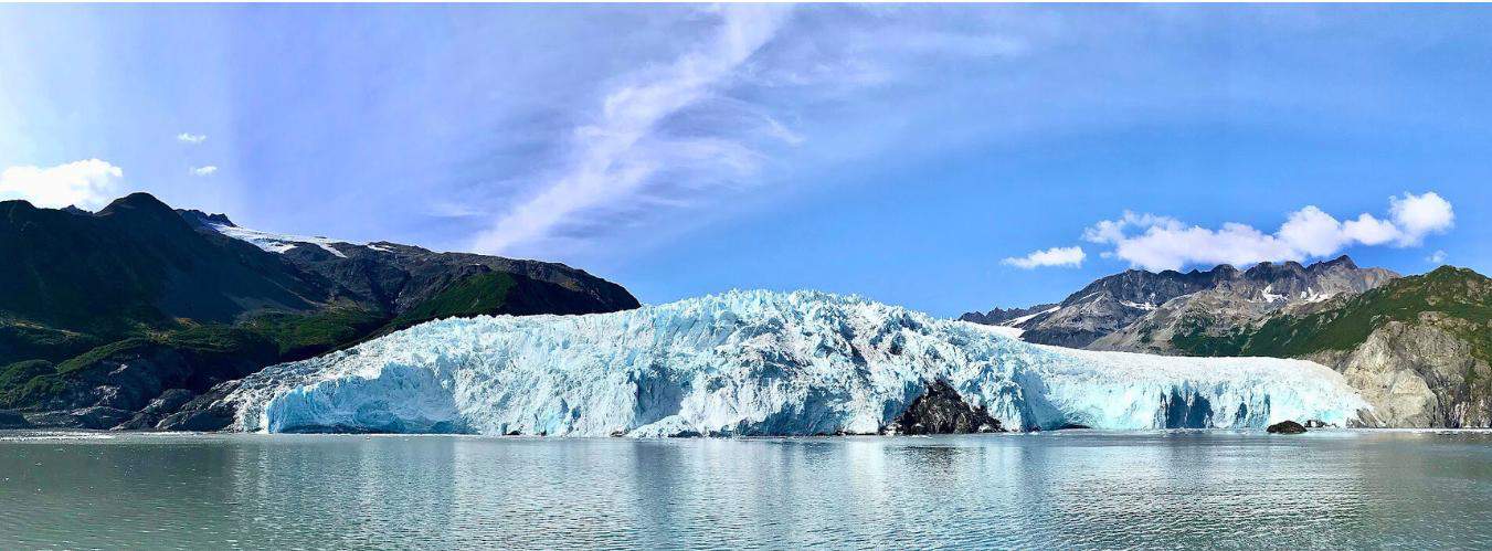 Aialik Glacier under a blue sky