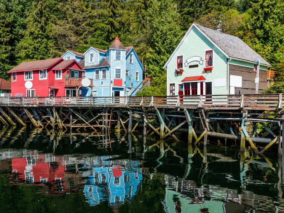 Colorful houses on a wooden dock in a harbor