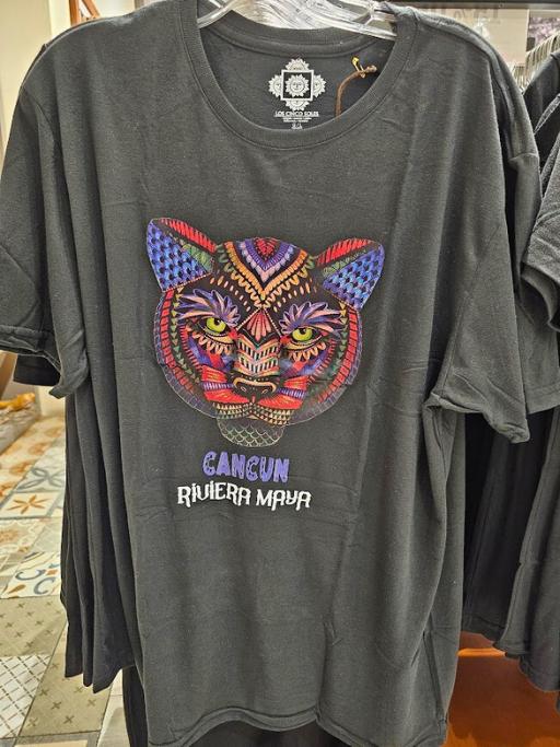 Black t-shirt with colorful cat and "Cancun Riviera Maya" written on the front