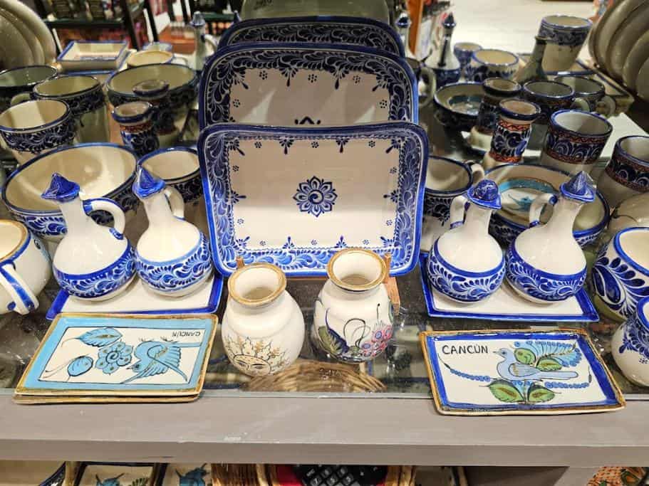 Shelf of azul blue and wite platters